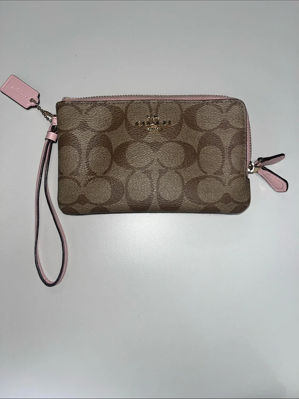 Coach Brown Signature Canvas Wristlet with Pink Trim